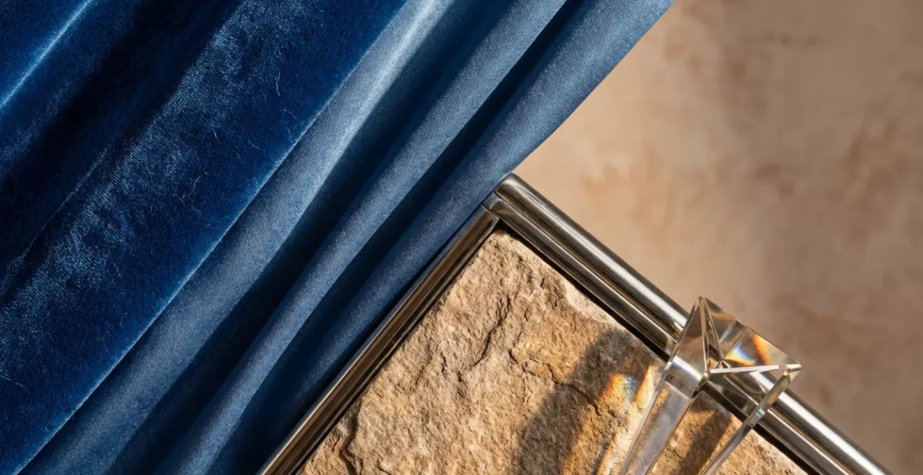 Interior space showing transition from soft watery textures to structured fire and earth elements